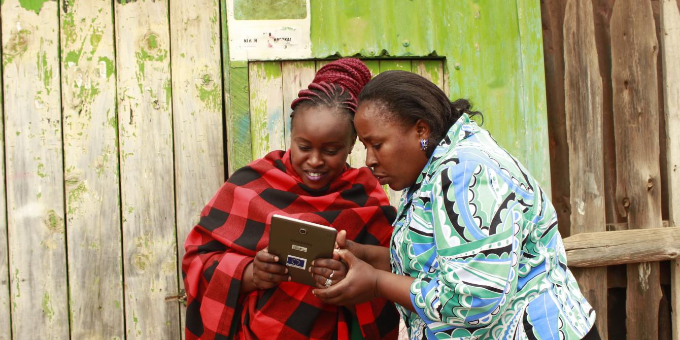 Lucy Wairimu and Margaret Kinyua during a literacy training held in Korogocho. Photo Credit Ngele Mwarimbo-Ali Lucy Wairimu and Margaret Kinyua during a literacy training held in Korogocho. Photo Credit Ngele Mwarimbo-Ali